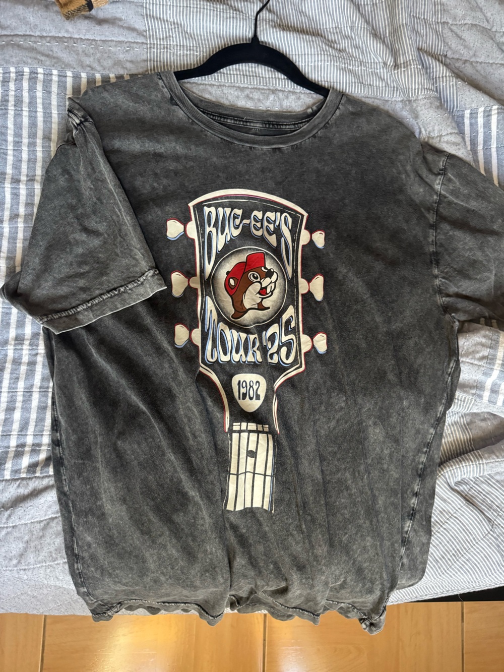 Vintage-Style Black Graphic Tee with Red Mascot Guitar Design